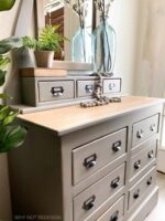 close up image of a dresser painted in gray brown MudPaint clay furniture paint