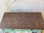 Top view of a cover of a bureau painted in Walnut clay furniture paint by MudPaint