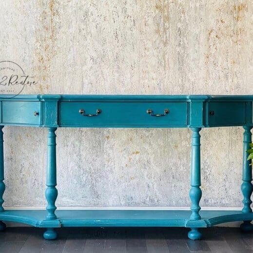 elegant multi-angled end table painted in harbor blue clay furniture paint by MudPaint